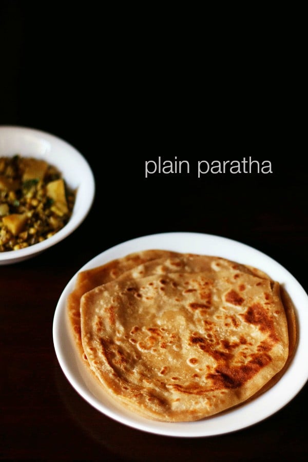 plain paratha on white plate with text layovers.