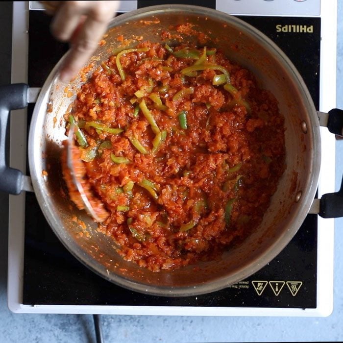sautéing kadai gravy for kadai paneer recipe. 